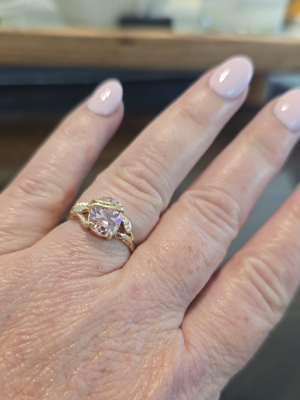 Gold Ring with Pink Gemstone and Leaf Accent - Picture 3 of 5